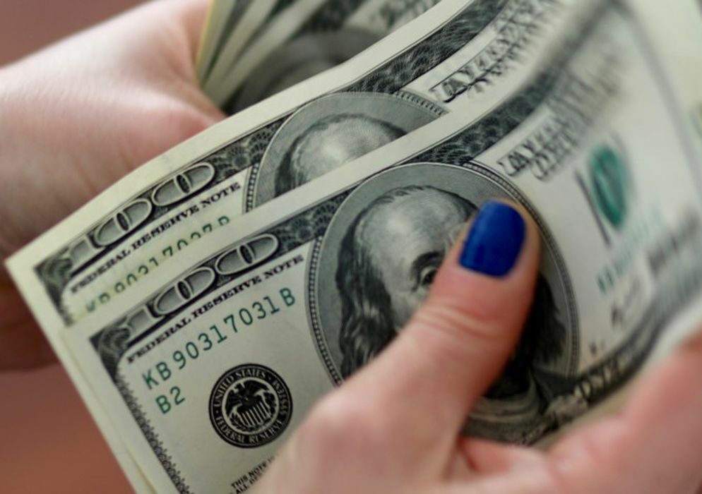 Dólar cai para R$ 5,14 e atinge menor valor em um mês